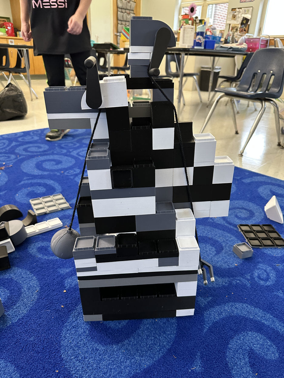 Tall black-and-white construction made during a classroom playtest